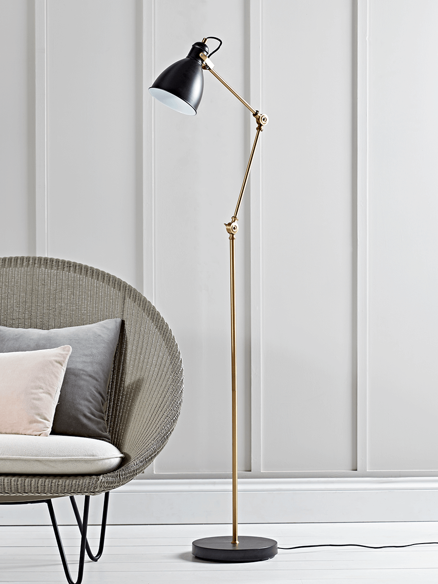 Product photograph of Black Brass Angle Floor Lamp from Cox and Cox