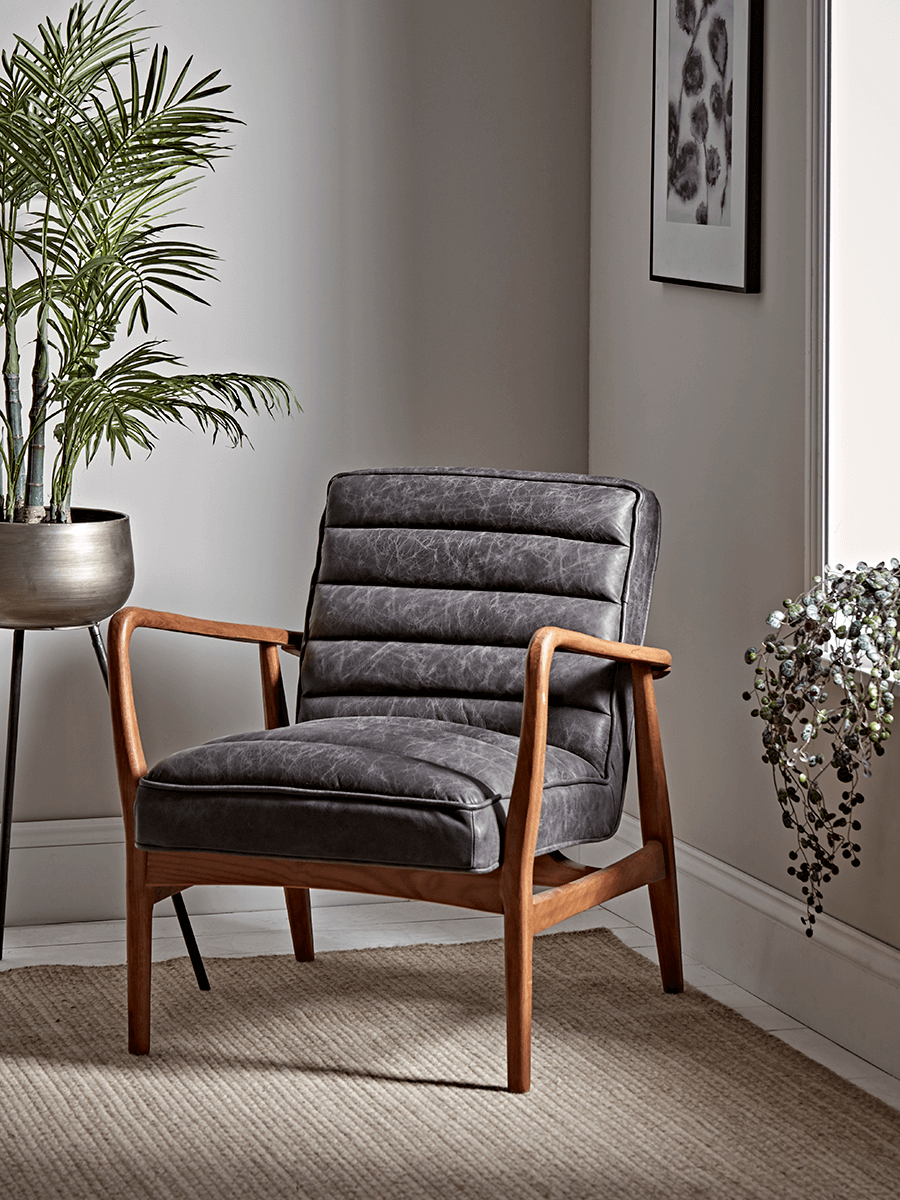 Product photograph of Ribbed Leather Armchair - Black from Cox and Cox