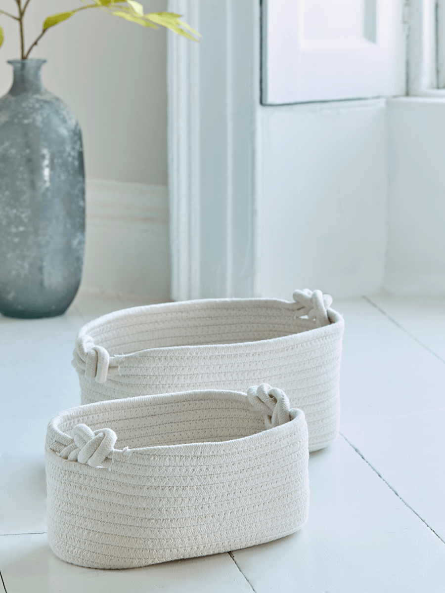 

Two Cream Woven Baskets