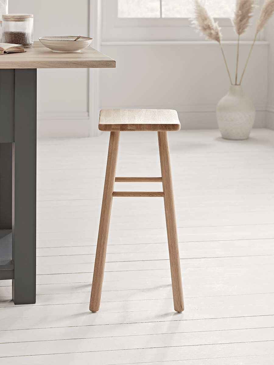 Product photograph of Oak Curved Topped Counter Stool - Natural from Cox and Cox.