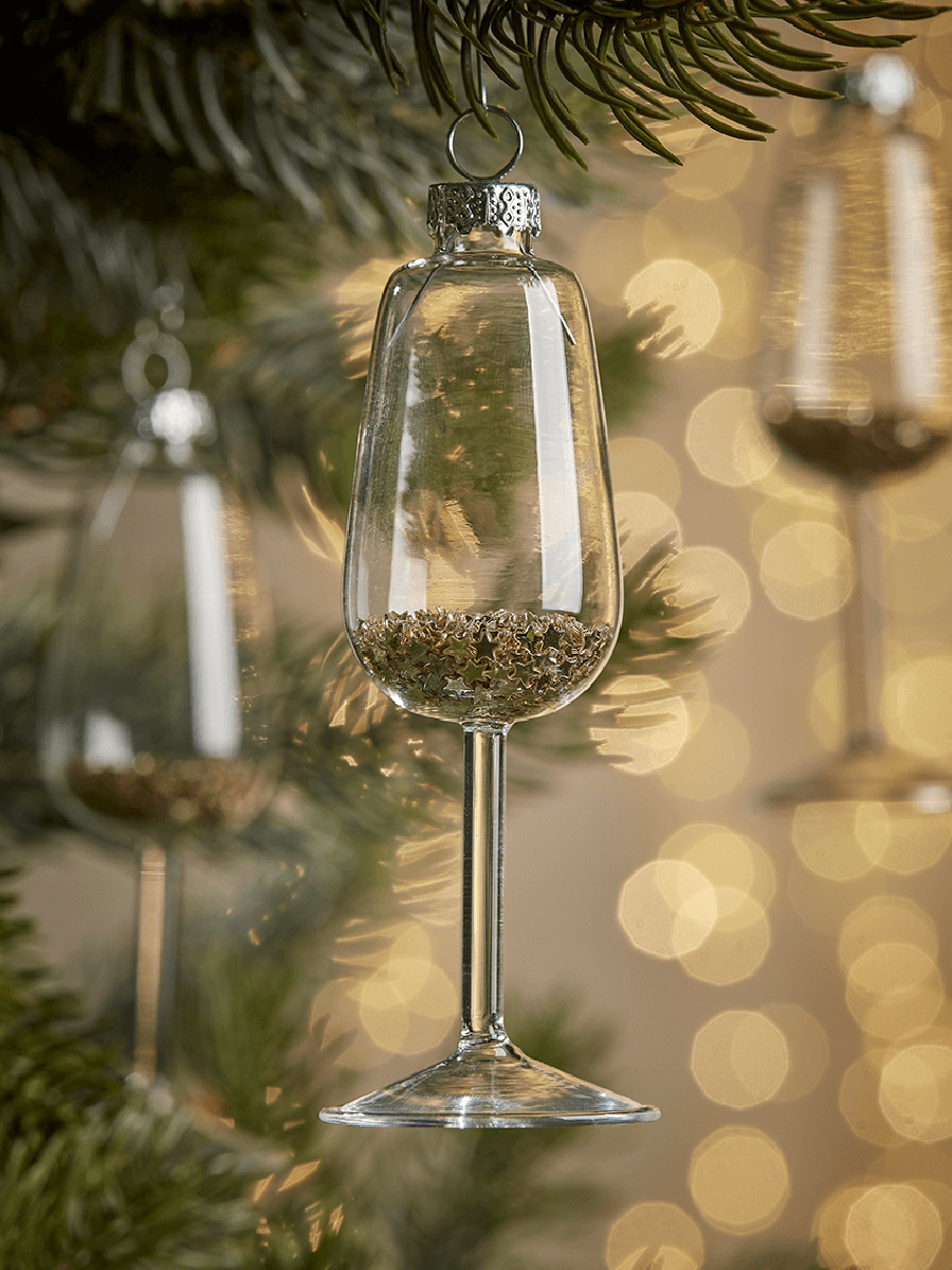 Photo of Four starry filled wine glass baubles