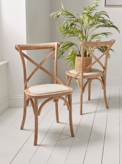 Two Wooden Cross Back Chairs