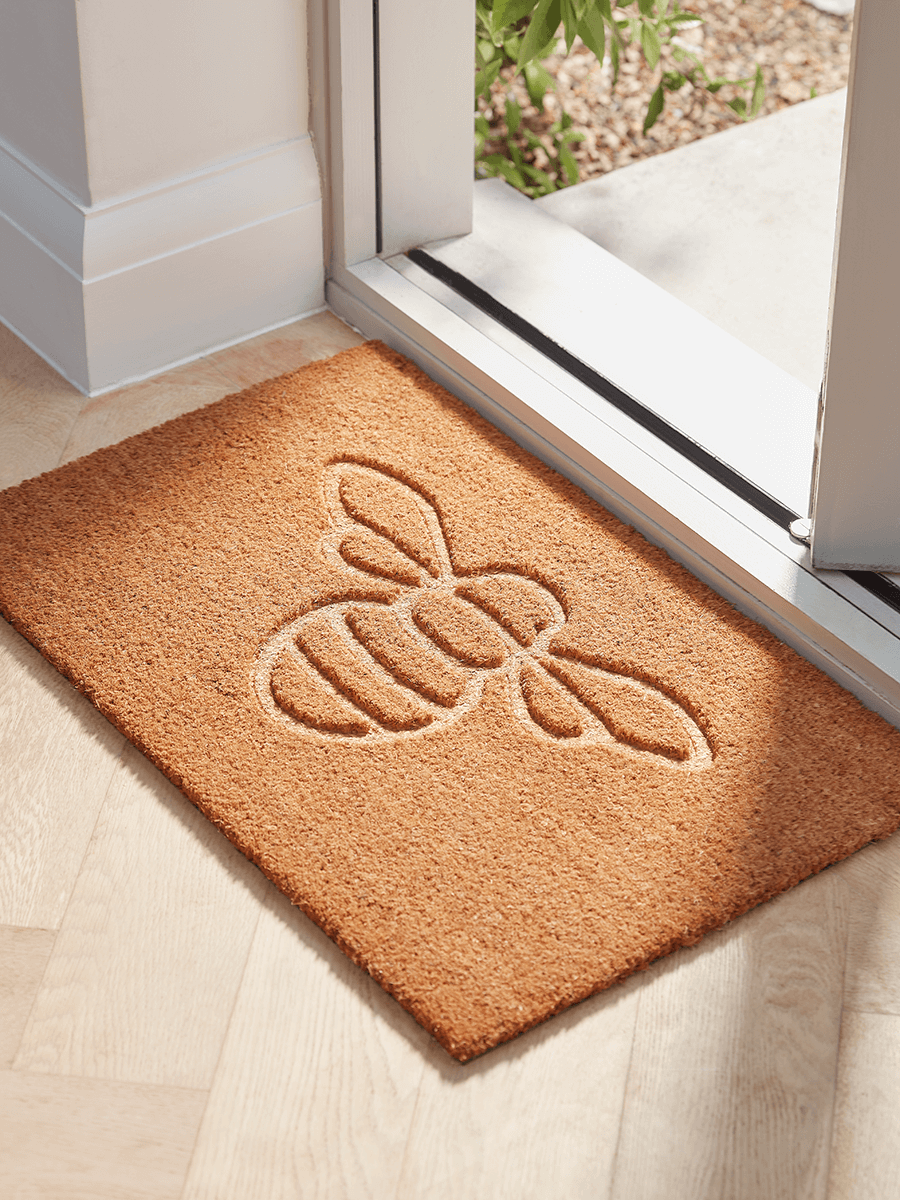 Product photograph of Embossed Bumble Bee Doormat from Cox and Cox