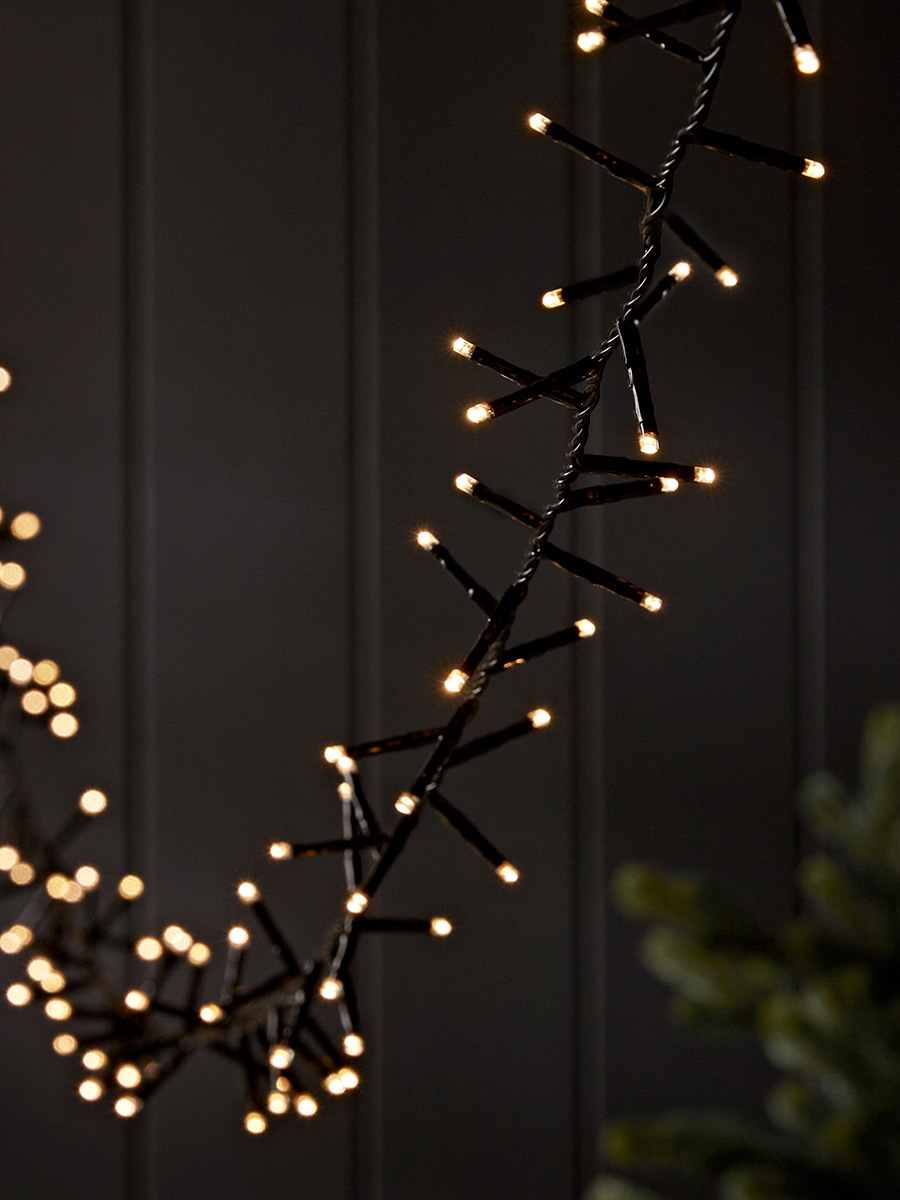 Product photograph of Solar String Lights from Cox and Cox.