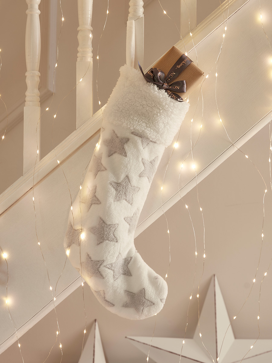 Photo of Festive stars fleecy stocking