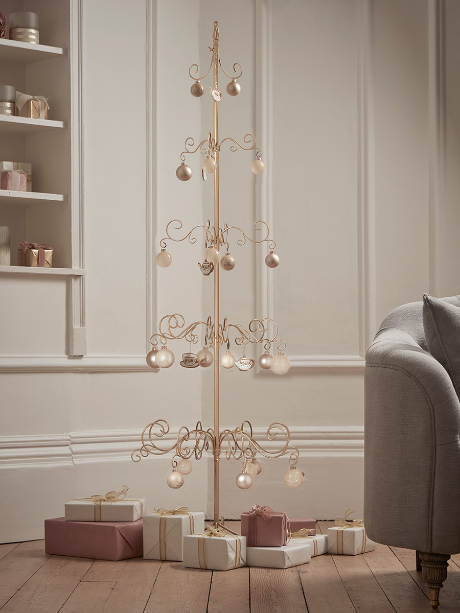 Photo of Ornate golden metal christmas tree