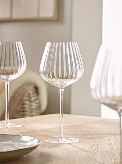 Four Ribbed Wine Glasses