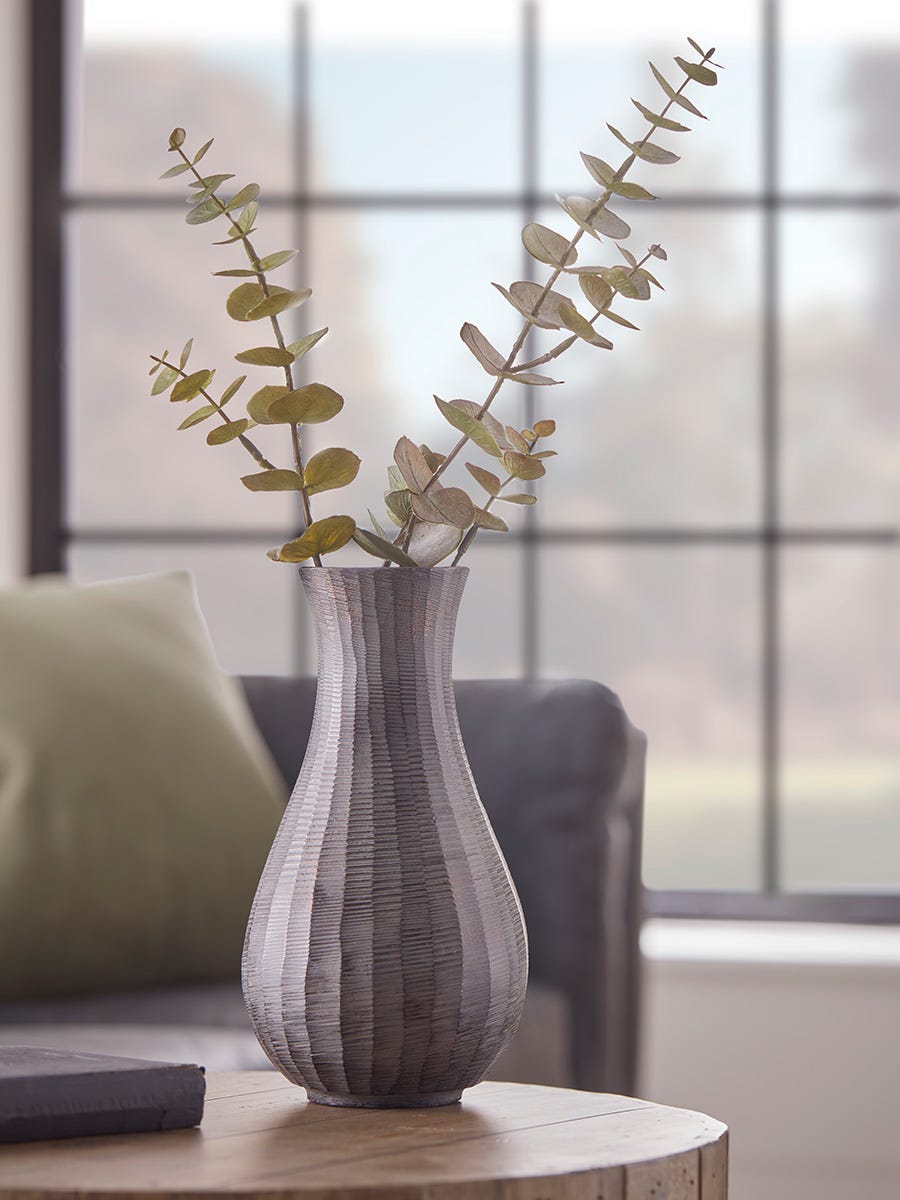 Photo of Fluted metal vase