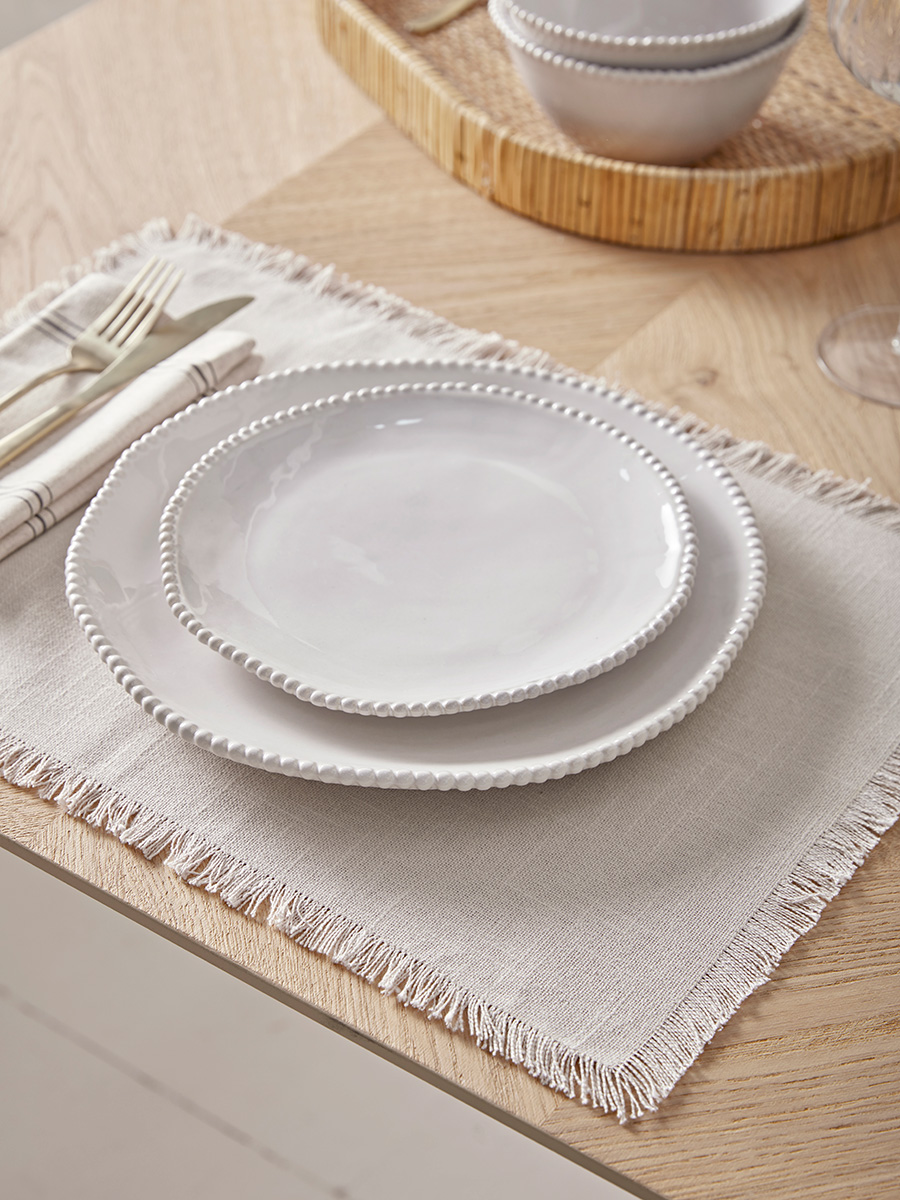 Photo of Four frayed edge placemats