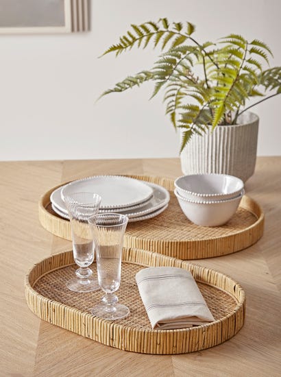 Two Oval Rattan Trays