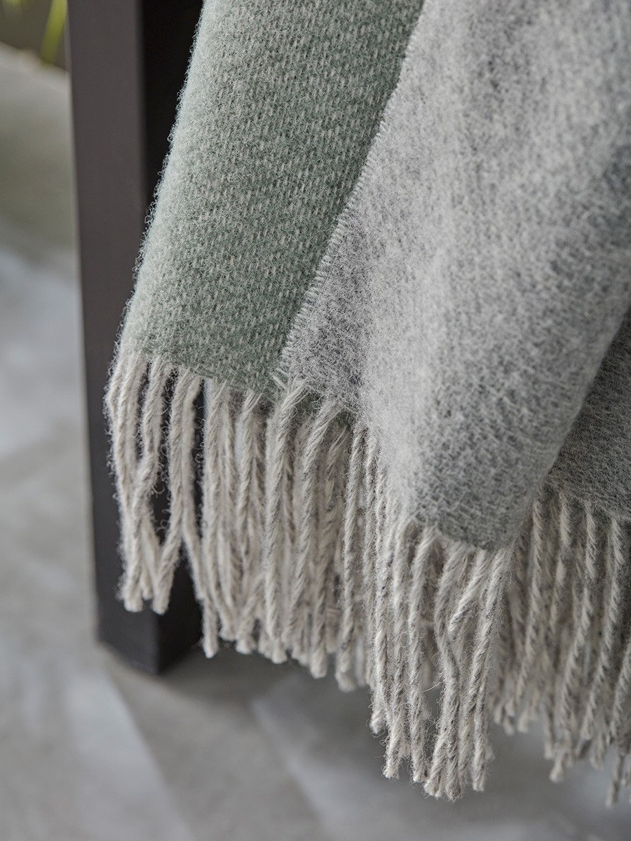 Product photograph of Soft Wool Reversible Throw - Sage Grey from Cox and Cox.