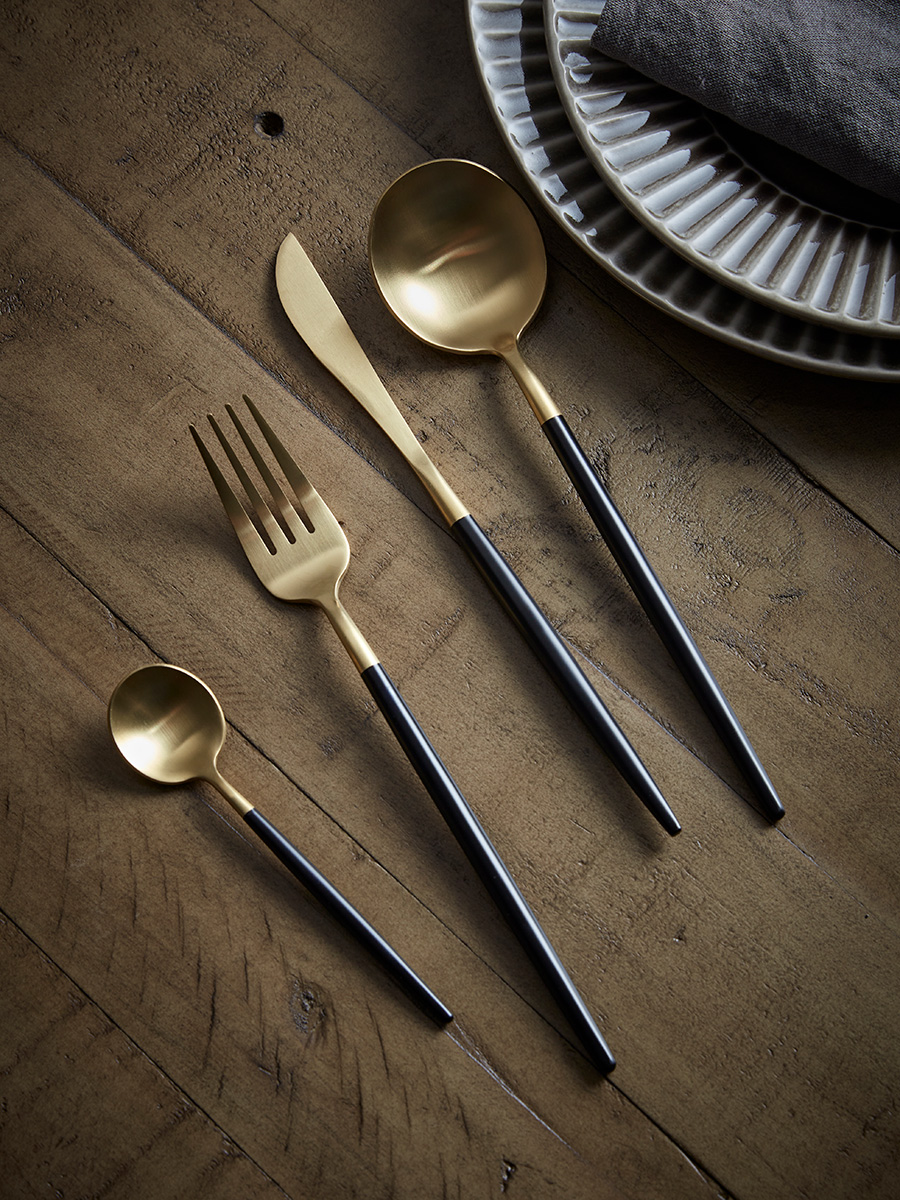 Product photograph of Sixteen Piece Cutlery Set - Black Gold from Cox and Cox