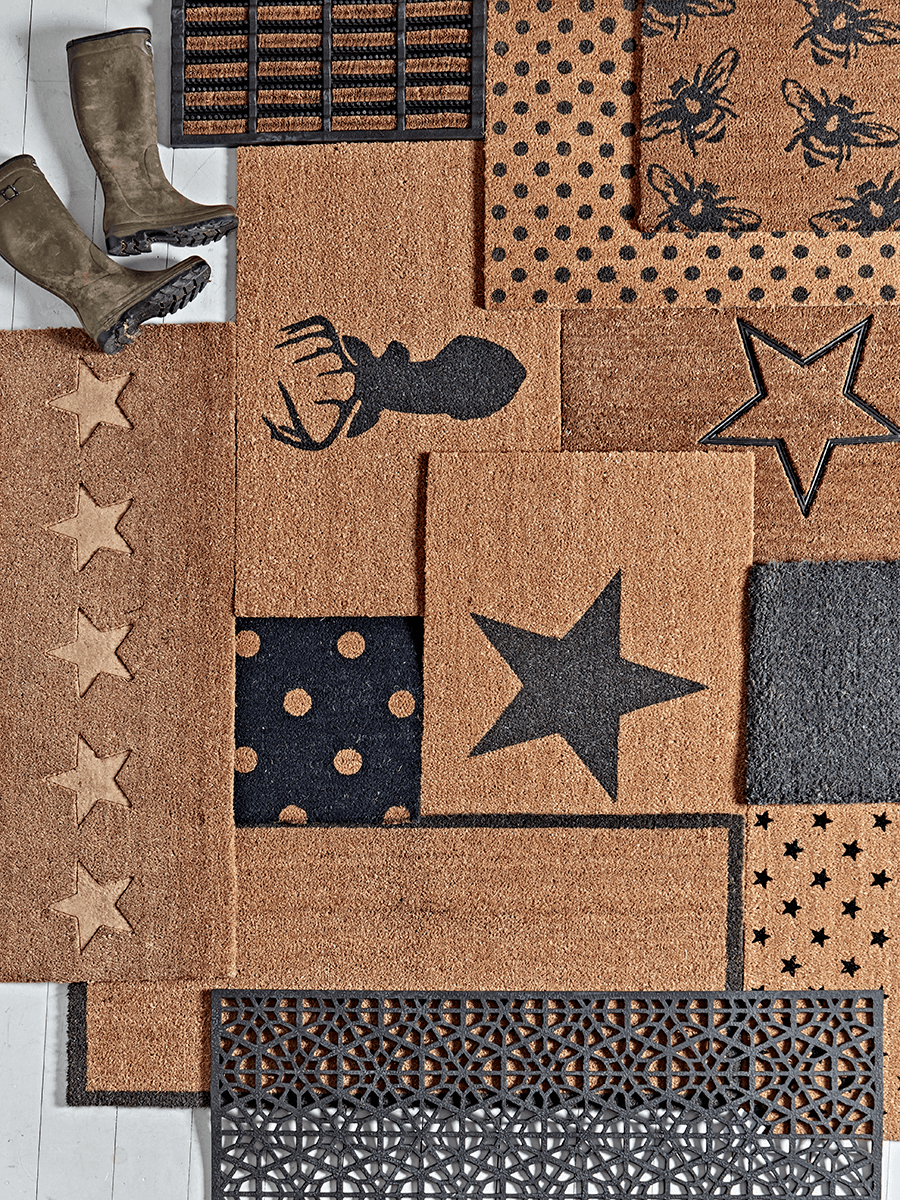 Product photograph of Embossed Stars Doormat - Double from Cox and Cox.