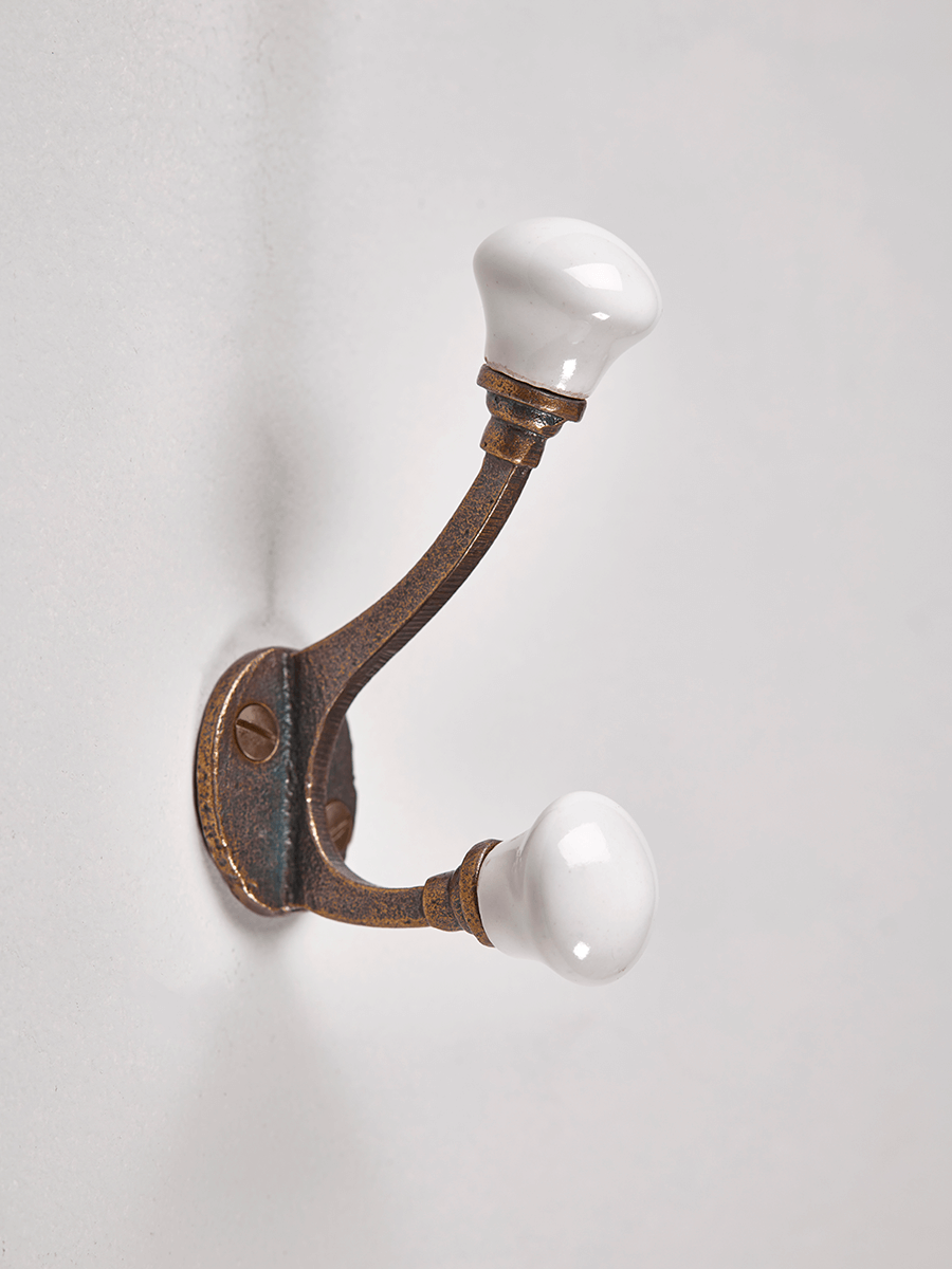 

Antique Brass Hook - White