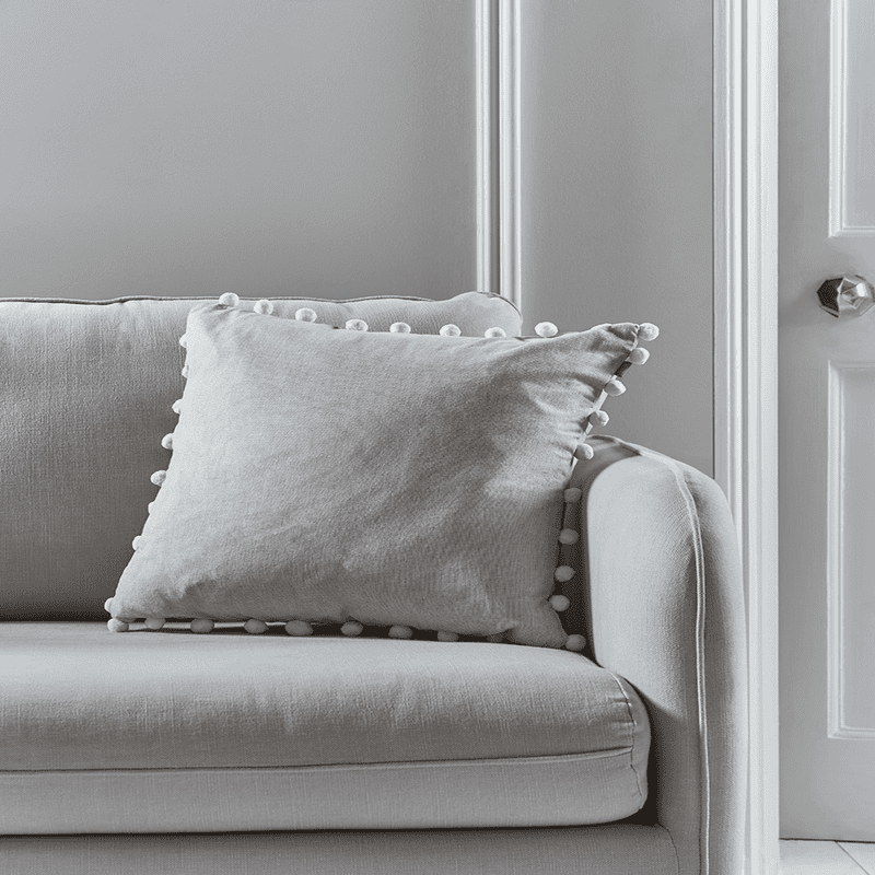 Grey pom pom cushion outlet