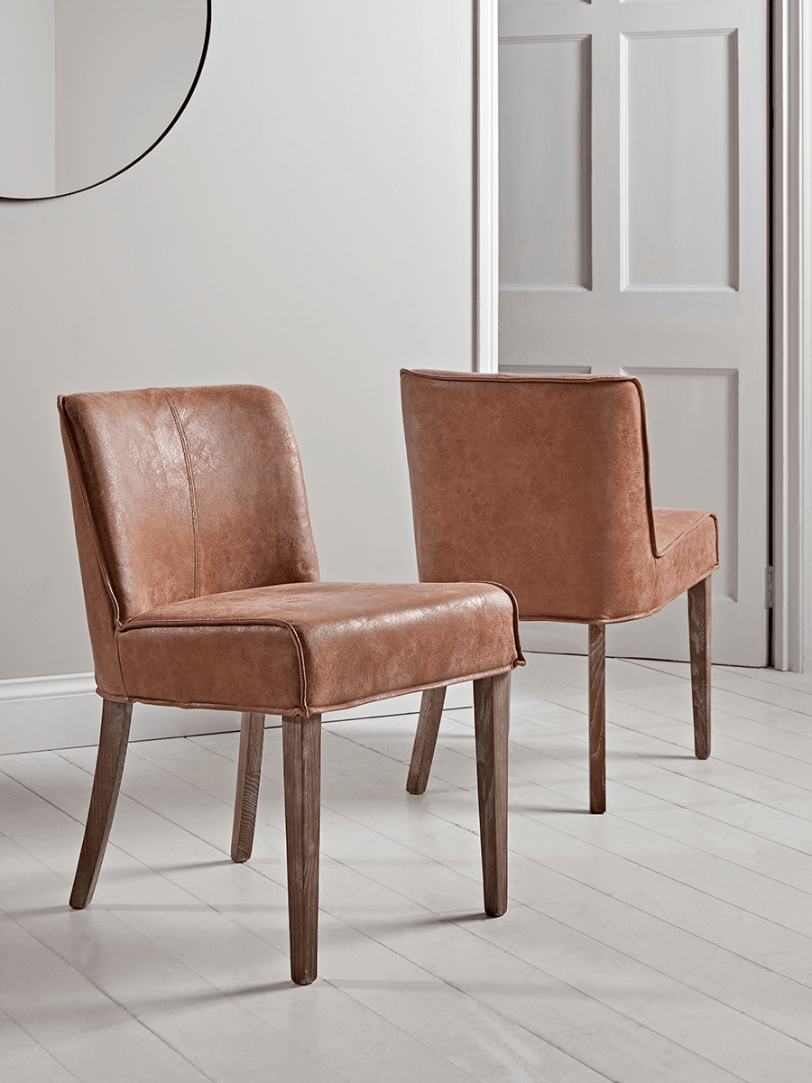 Product photograph of Two Leather Wood Dining Chairs from Cox and Cox