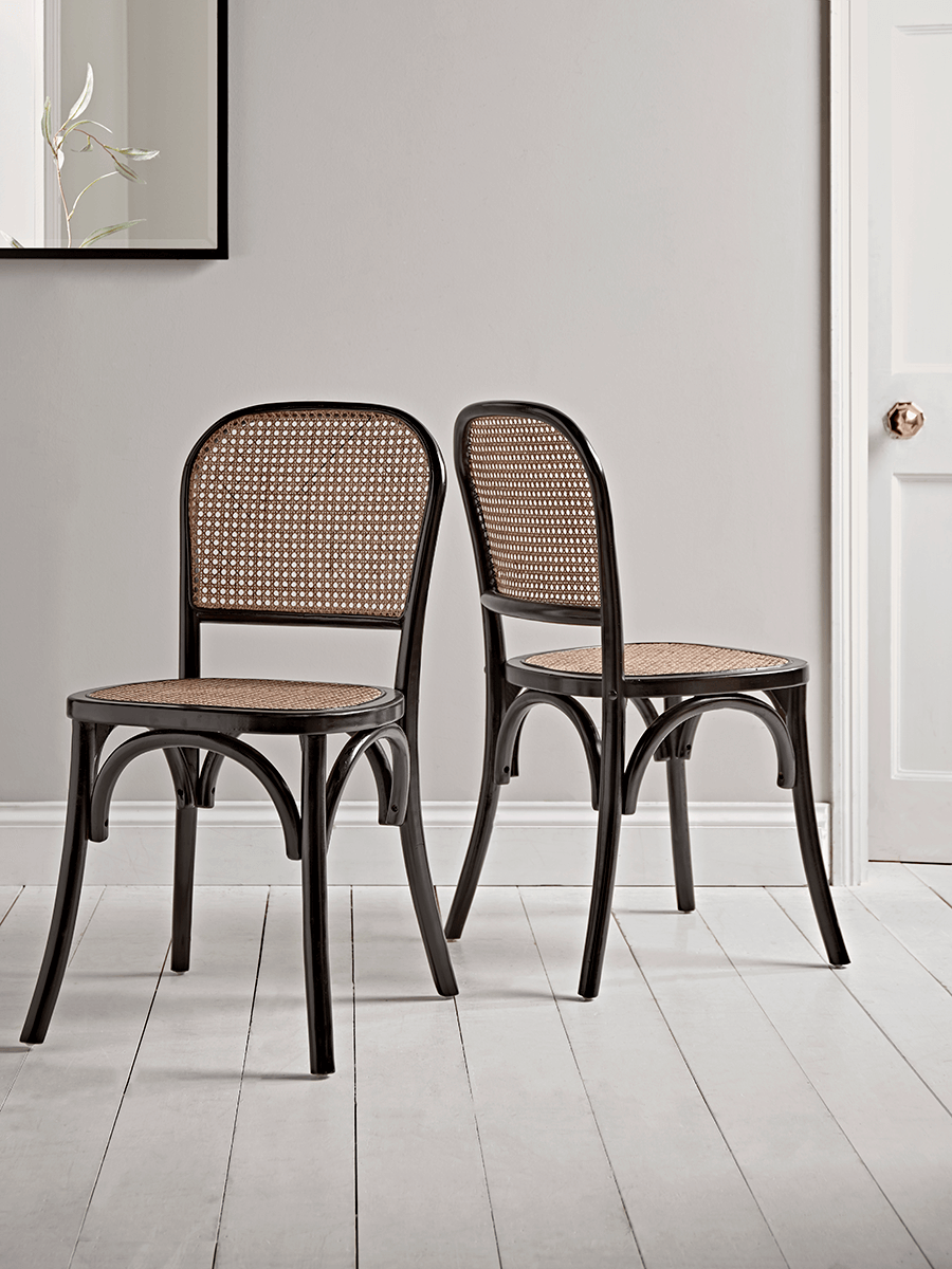 Product photograph of Two Cane Webbing Dining Chairs - Black from Cox and Cox