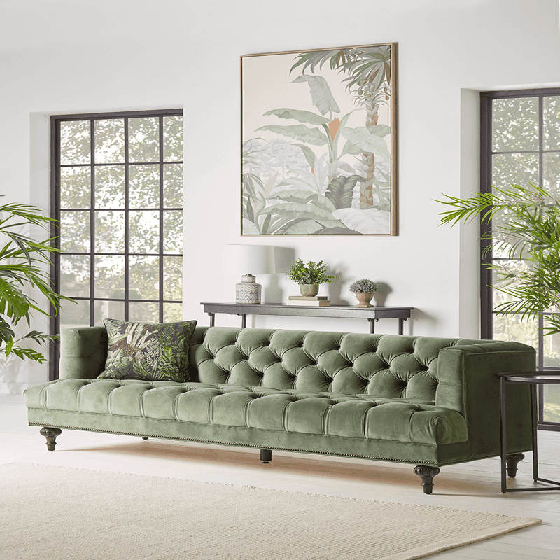 Green tufted deals sofa