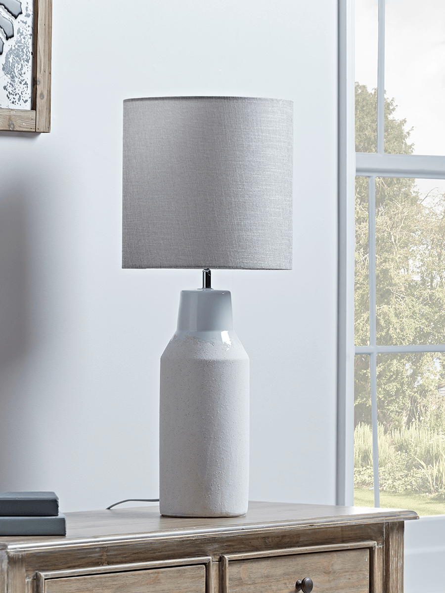 Photo of Soft grey ceramic bottle lamp