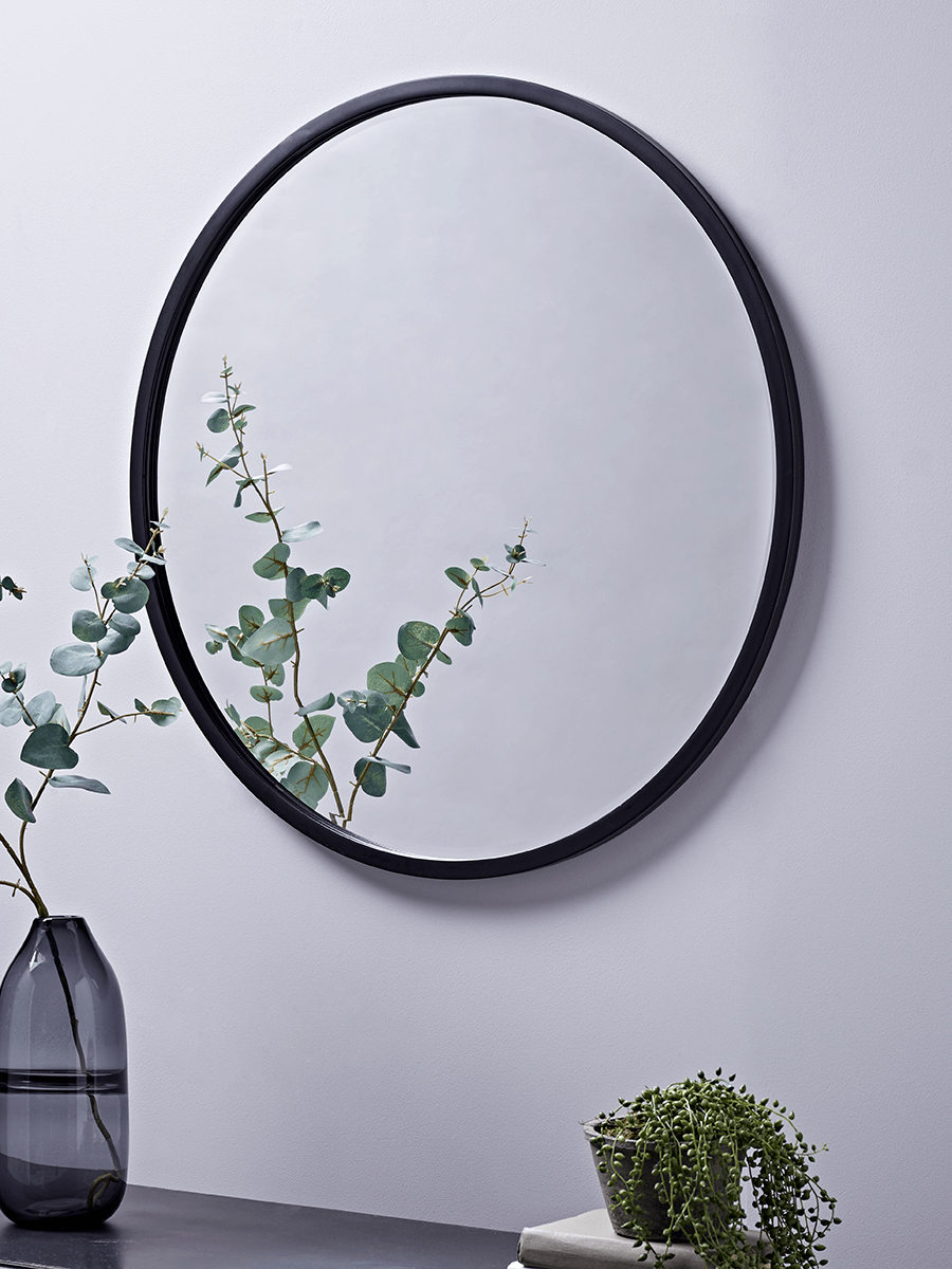 Photo of Black bevelled round mirror - large