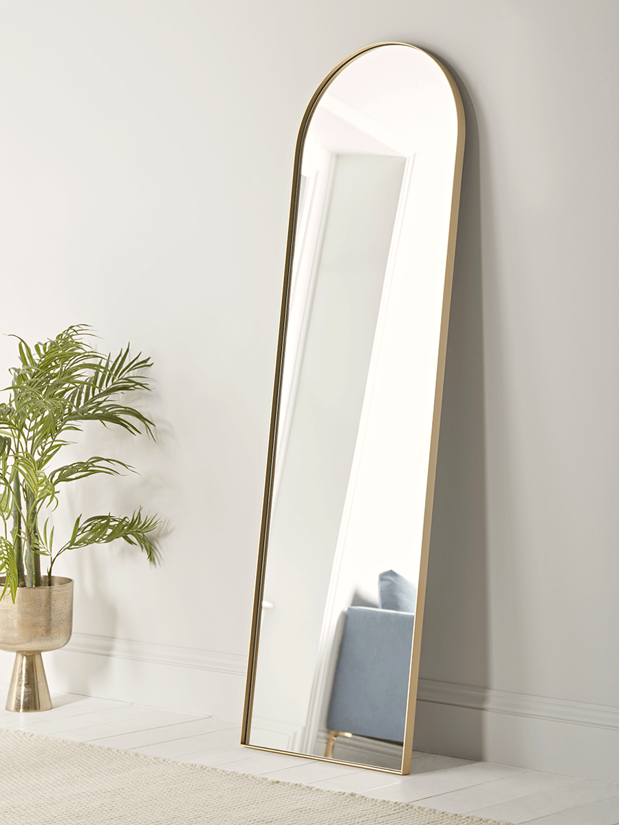 Product photograph of Slim Arch Mirror - Soft Gold from Cox and Cox