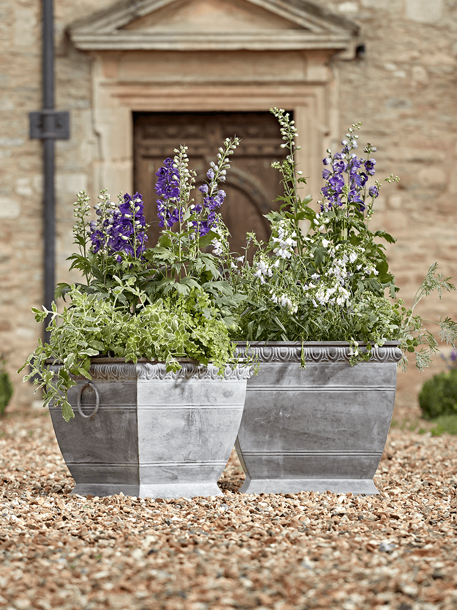 

Two Ornate Zinc Planters