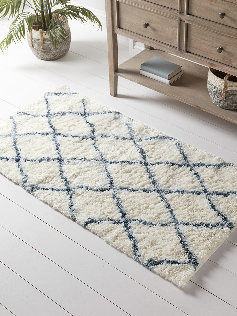 Product photograph of Anneli Bedside Rug from Cox and Cox