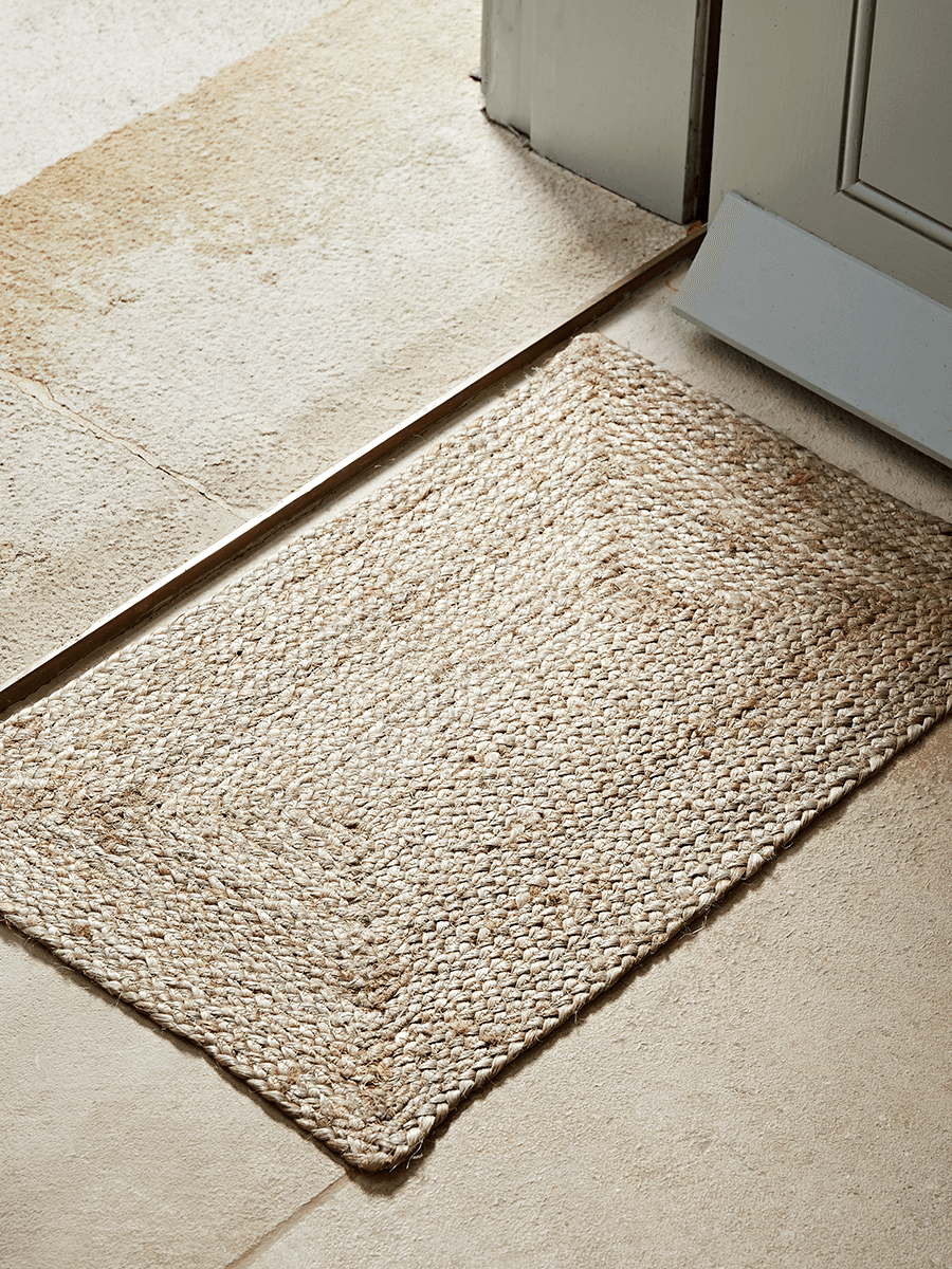 Product photograph of Braided Jute Doormat from Cox and Cox