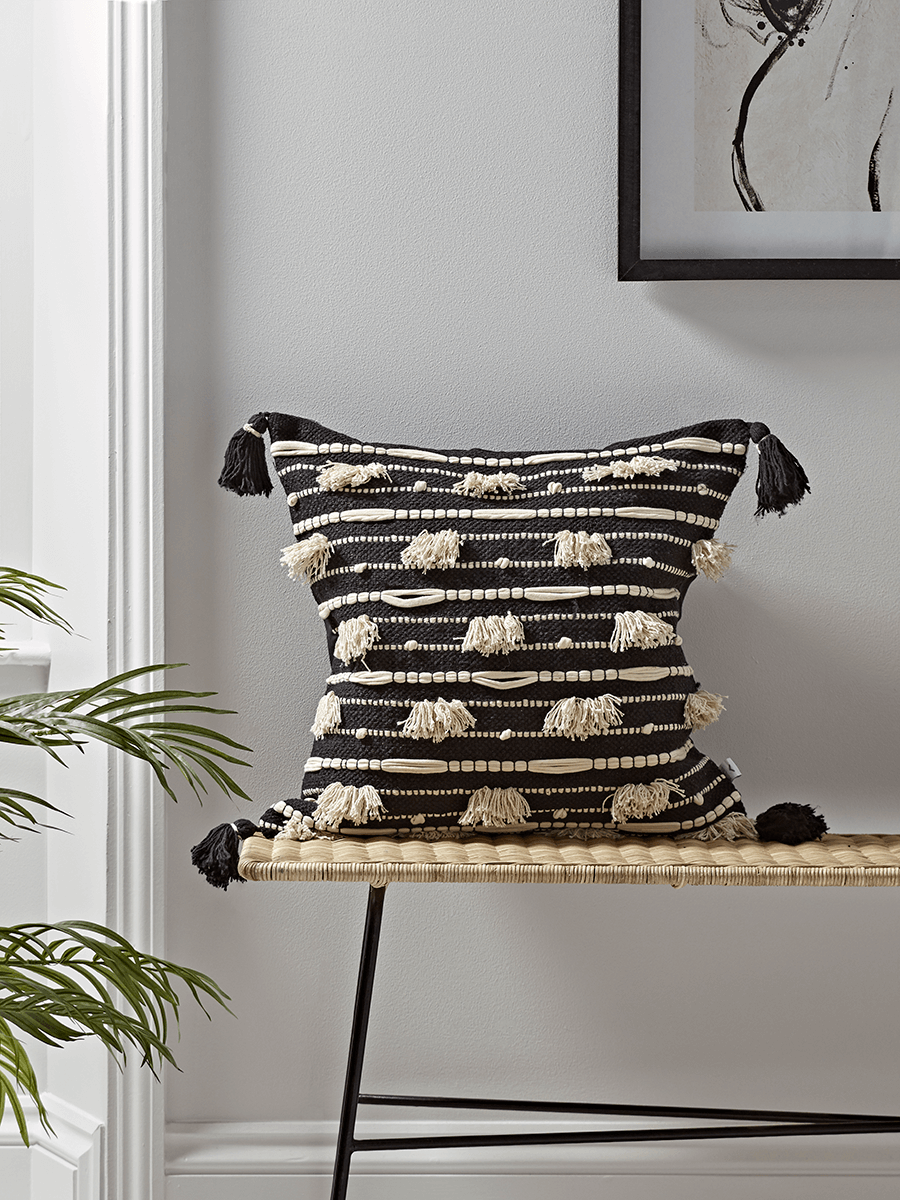

Black Tufted Cushion