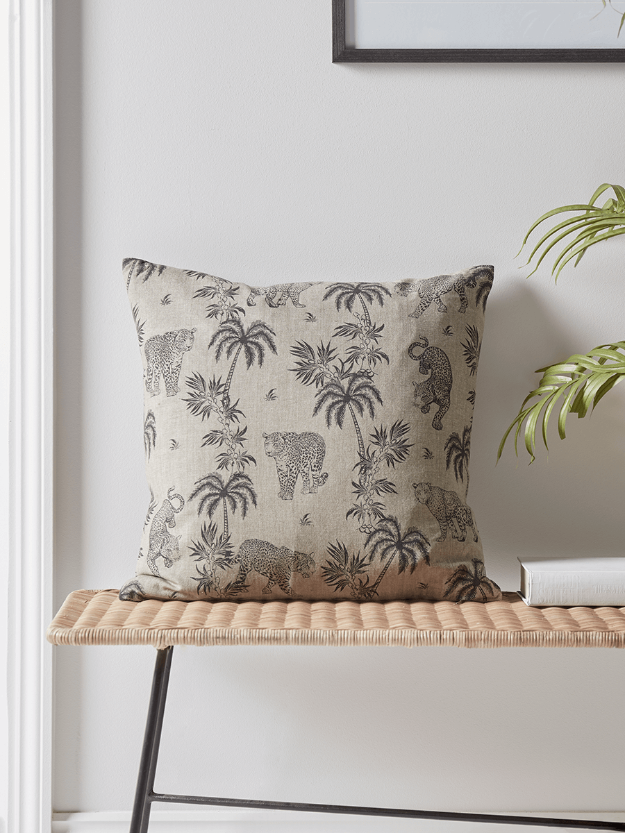 Product photograph of Leopard Palm Tree Cushion from Cox and Cox