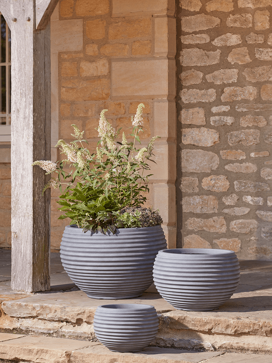 Product photograph of Three Ridged Plastic Curved Planters - Deep Grey from Cox and Cox