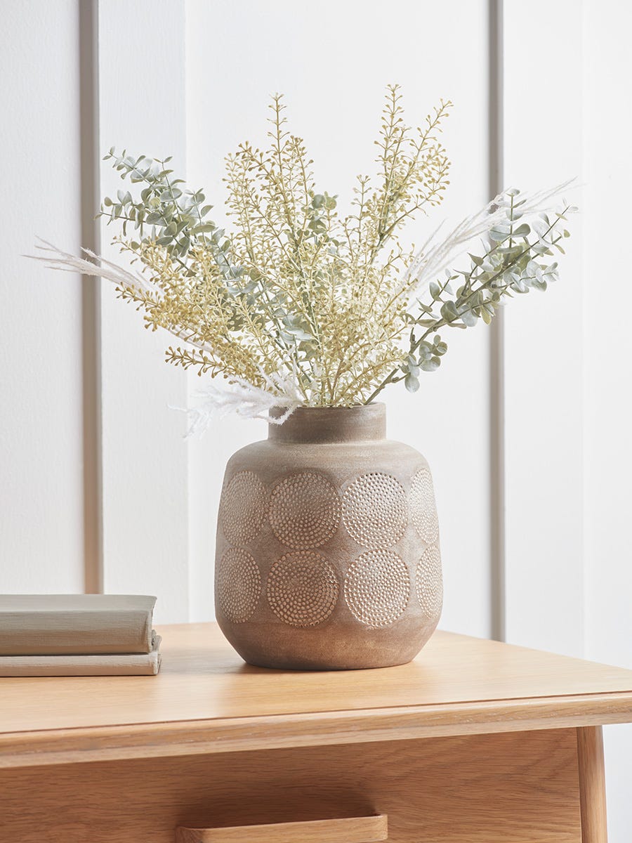 Photo of Circle embossed stoneware vase