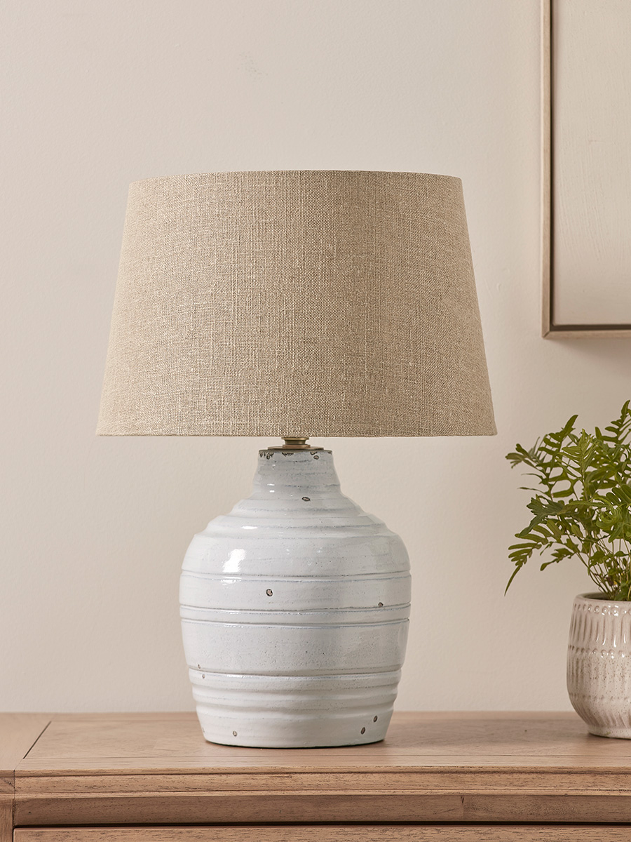 Photo of Distressed whitewashed table lamp