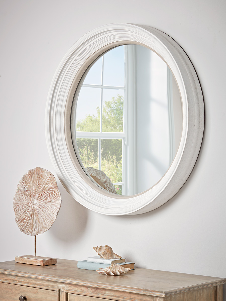 Photo of White ribbed round mirror