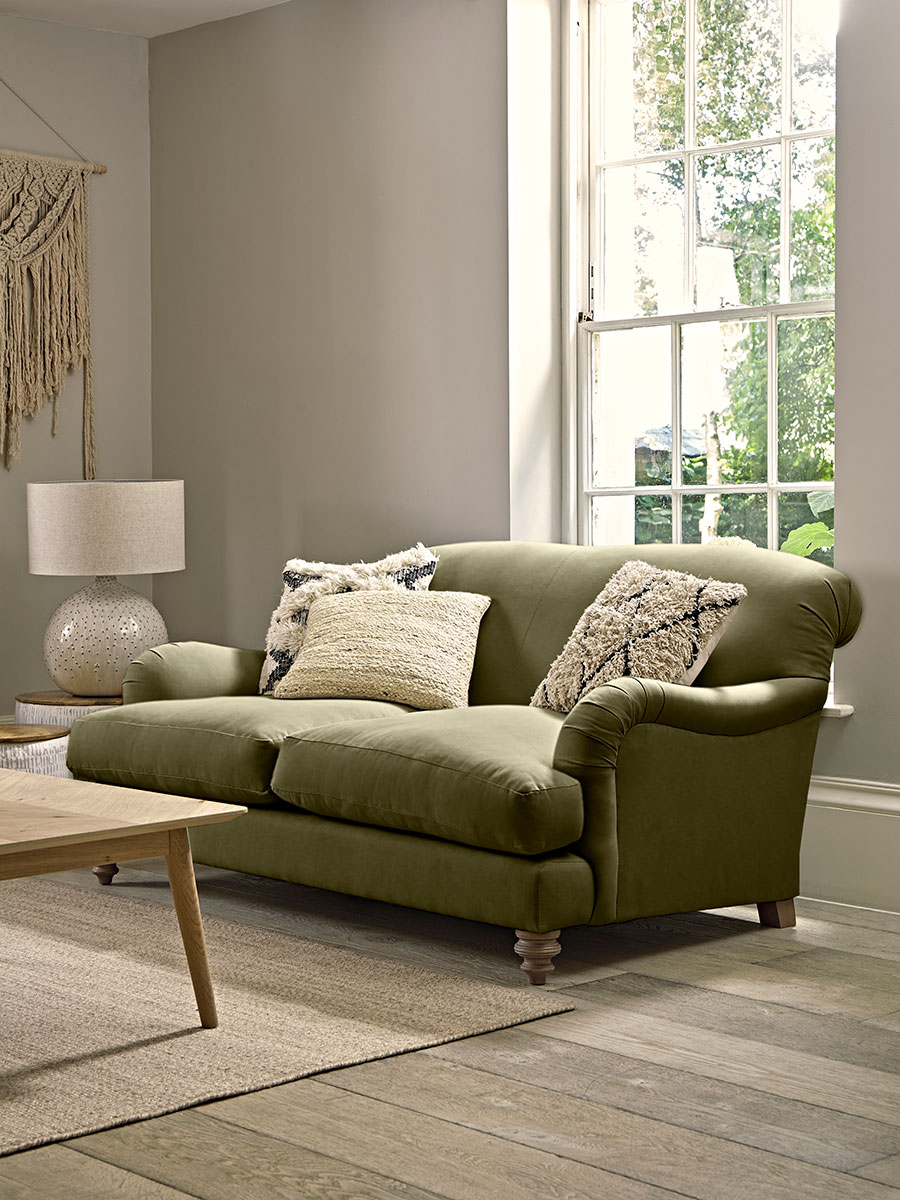 Photo of Cosy two seater sofa - moss velvet