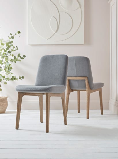 Two Manila Dining Chairs