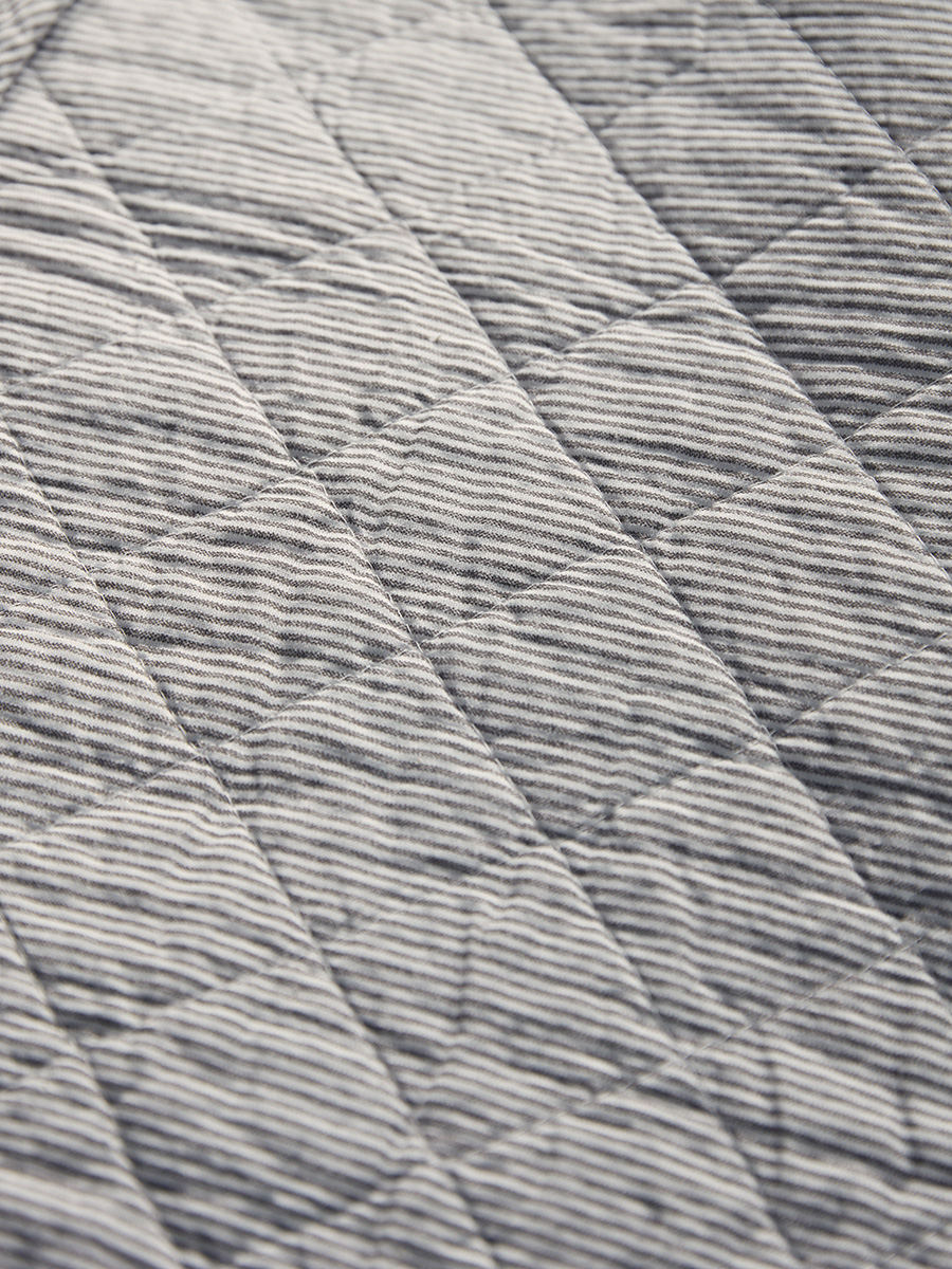 Product photograph of Cotton Black White Quilted Throw from Cox and Cox.
