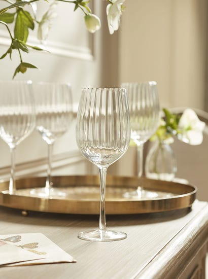 Four Fluted Wine Glasses