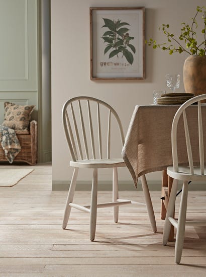 Two White Spindleback Dining Chairs