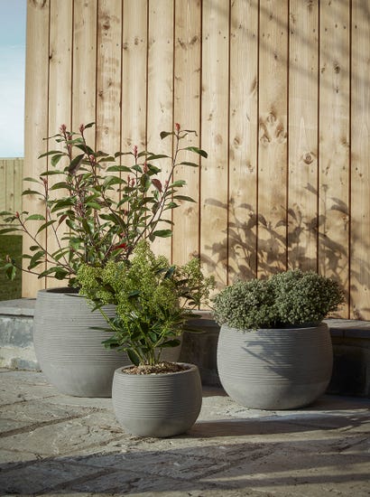 Three Ribbed Concrete Planters