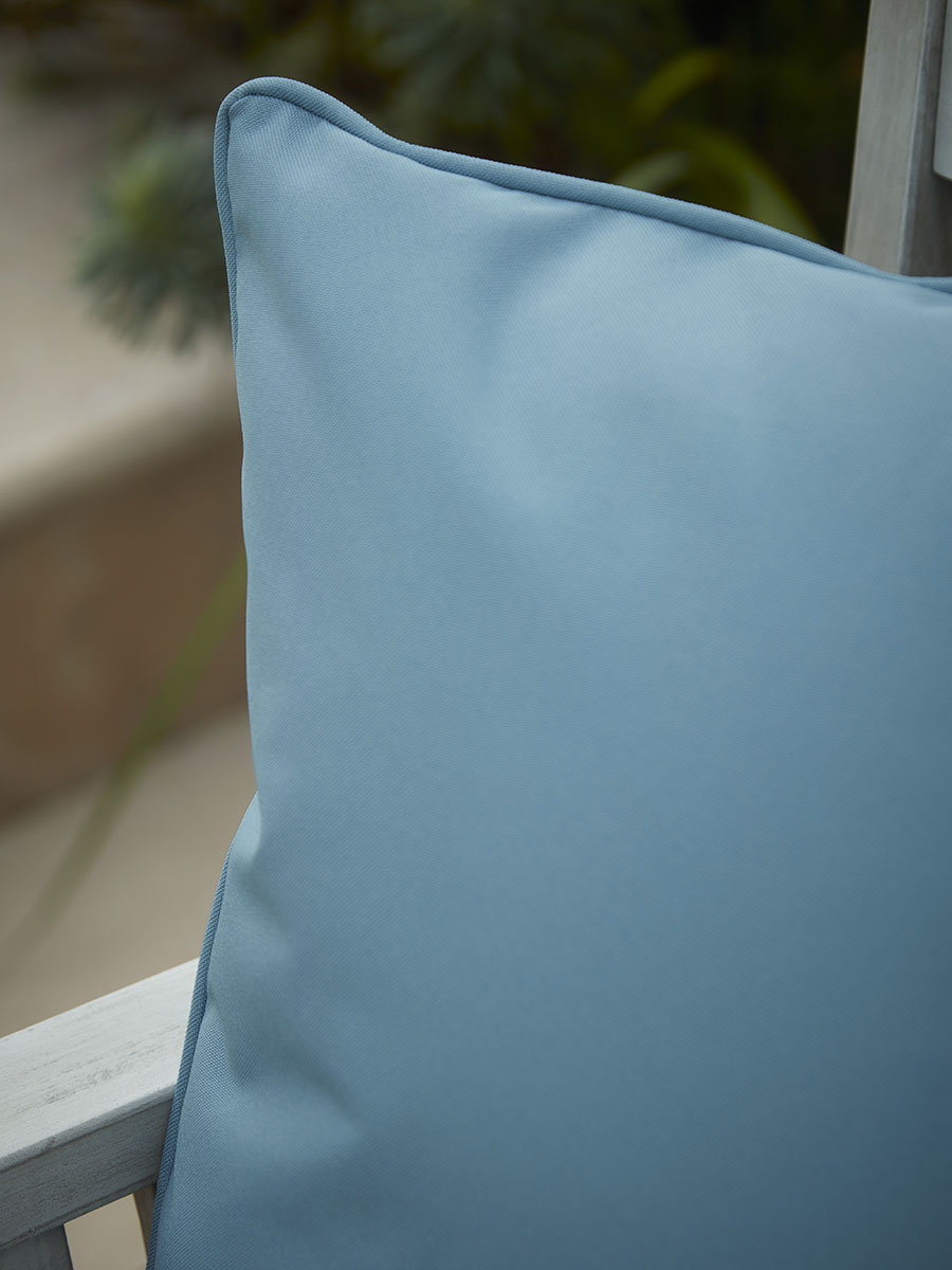 Product photograph of Reva Outdoor Cushion - Dawn Blue from Cox and Cox.