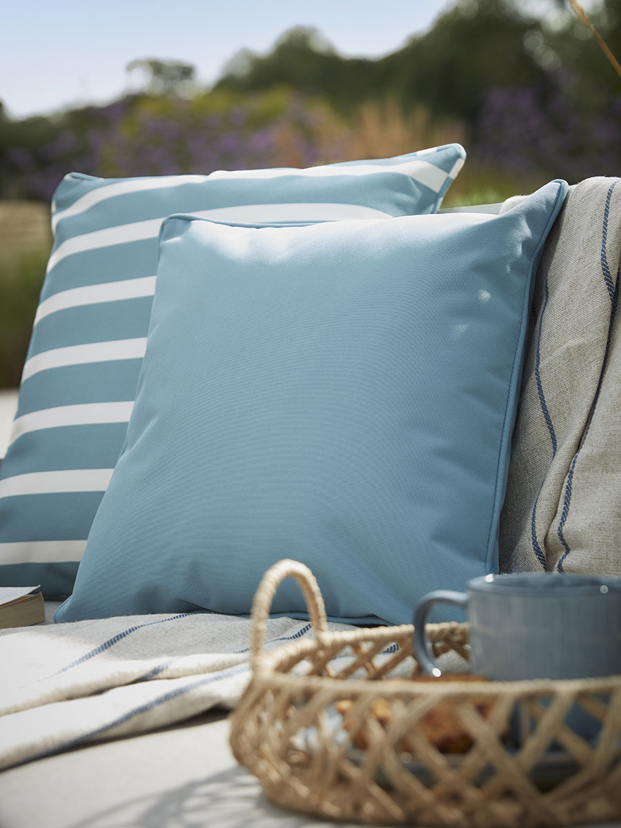 Product photograph of Reva Outdoor Cushion - Dawn Blue from Cox and Cox