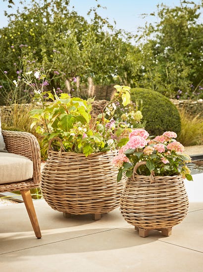 Two Indoor Outdoor Tapered Rattan Planters