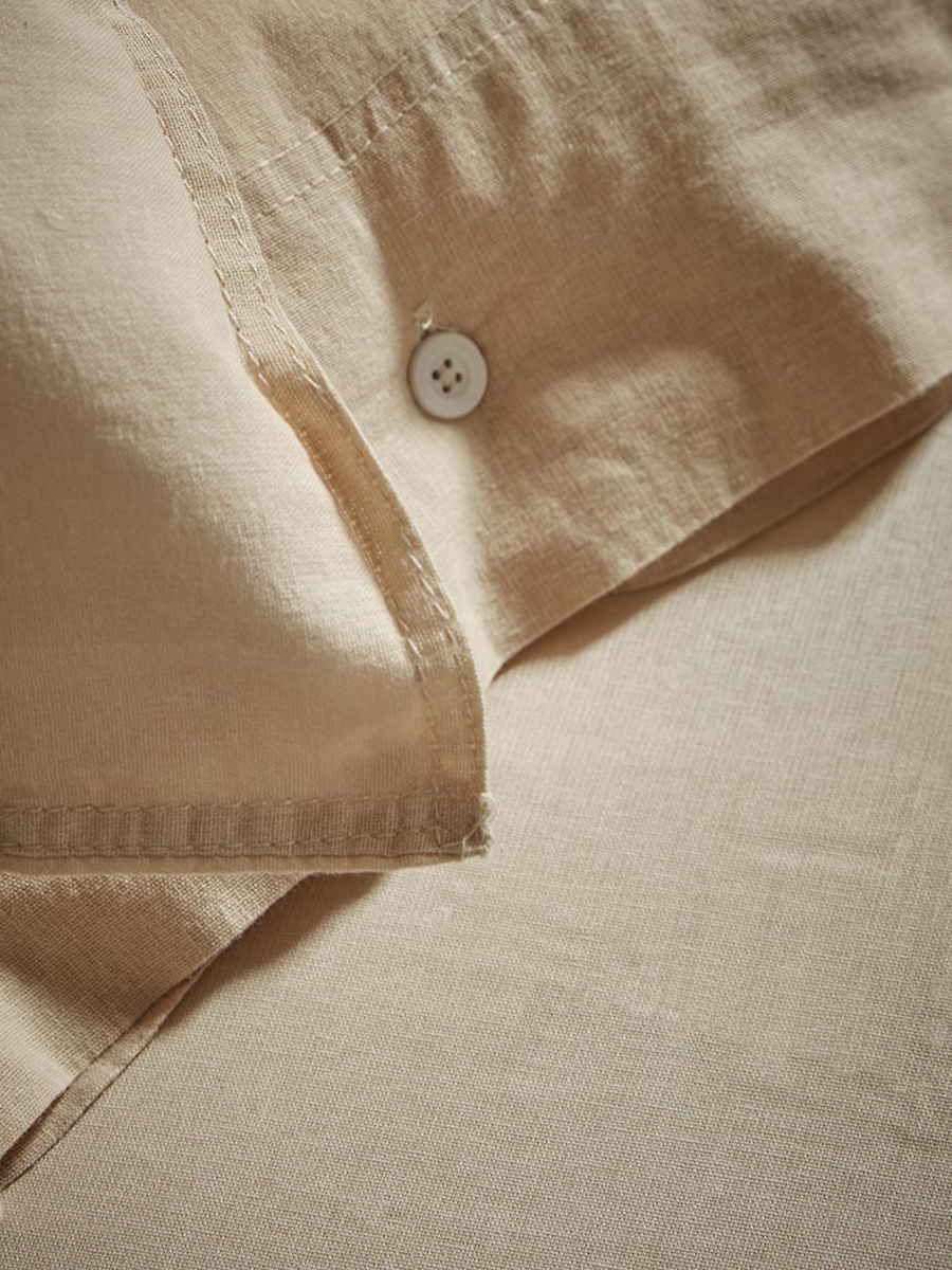 Product photograph of Two Cotton Pillowcases - Flax from Cox and Cox.